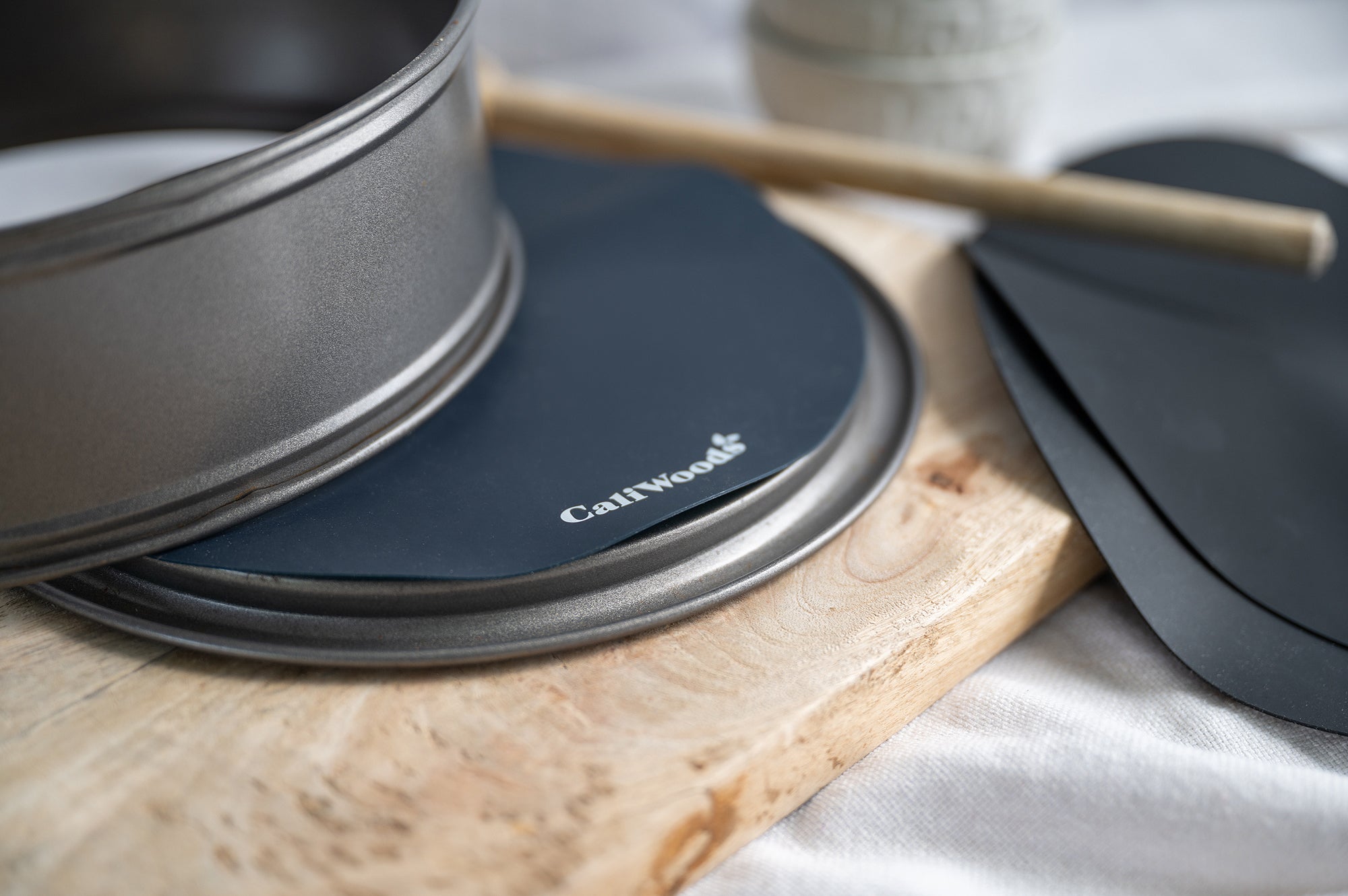 Close up of CaliWoods circular baking mats in a cake tin