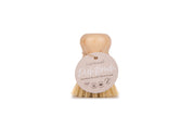 A bamboo pot brush